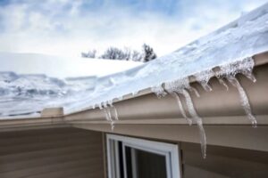 What is the fastest way to melt ice in gutters