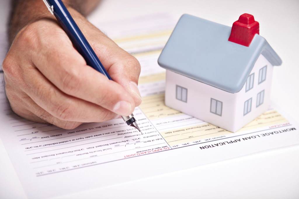 Alabama couple reviewing first-time home buyer loan options