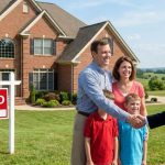 Family comparing the best mortgage lenders in Alabama while reviewing home loan documents