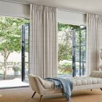 Elegant budget curtains making a modern living room look luxurious