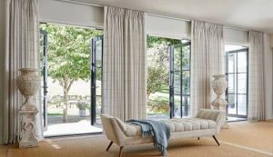 Elegant budget curtains making a modern living room look luxurious