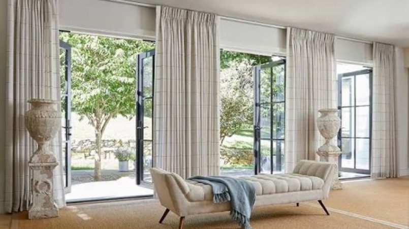 Elegant budget curtains making a modern living room look luxurious