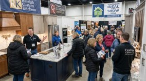 Homeowners exploring kitchen remodeling displays and speaking with local contractors at the Fairgrounds Southern Ideal Home Show 2026 inside the North Carolina State Fairgrounds in Raleigh
