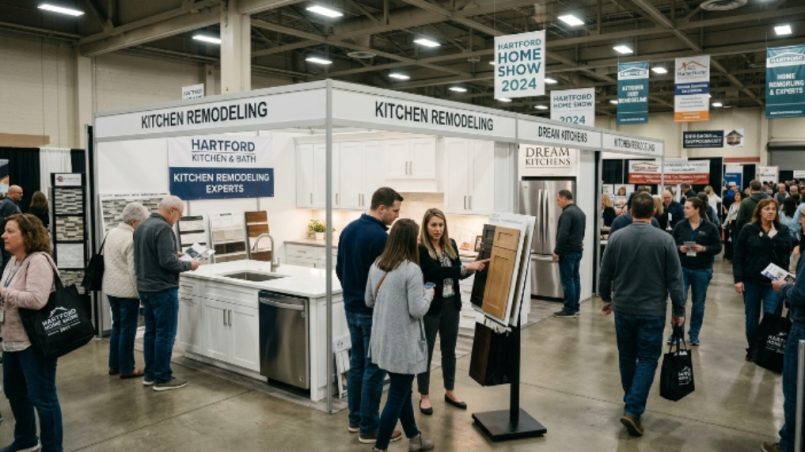 Visitors browsing kitchen remodeling booths at a Hartford home show