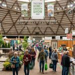 Visitors exploring exhibitor booths at the Tacoma Home + Garden Show 2027 inside the Tacoma Dome Exhibition Hall